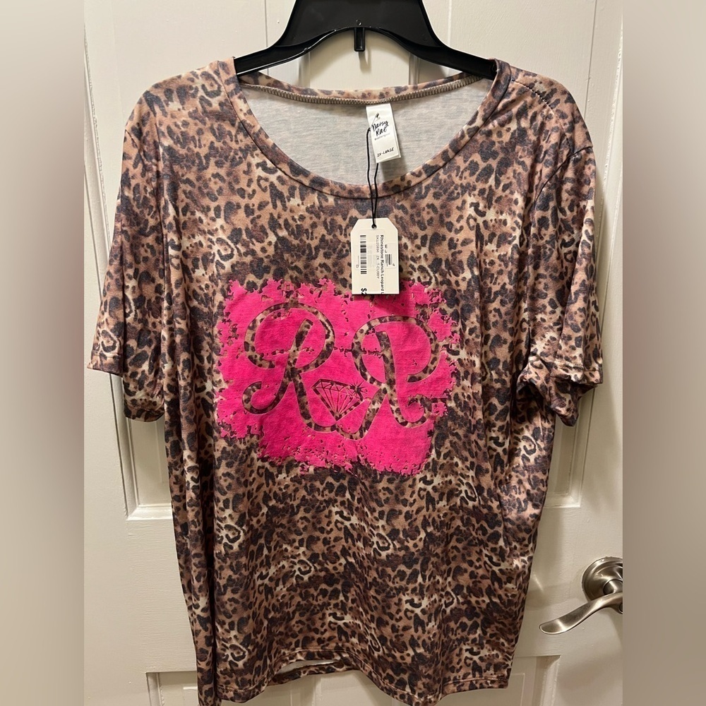 Daisy Rae woman’s top. Leopard print. Brand new. Size 2X.